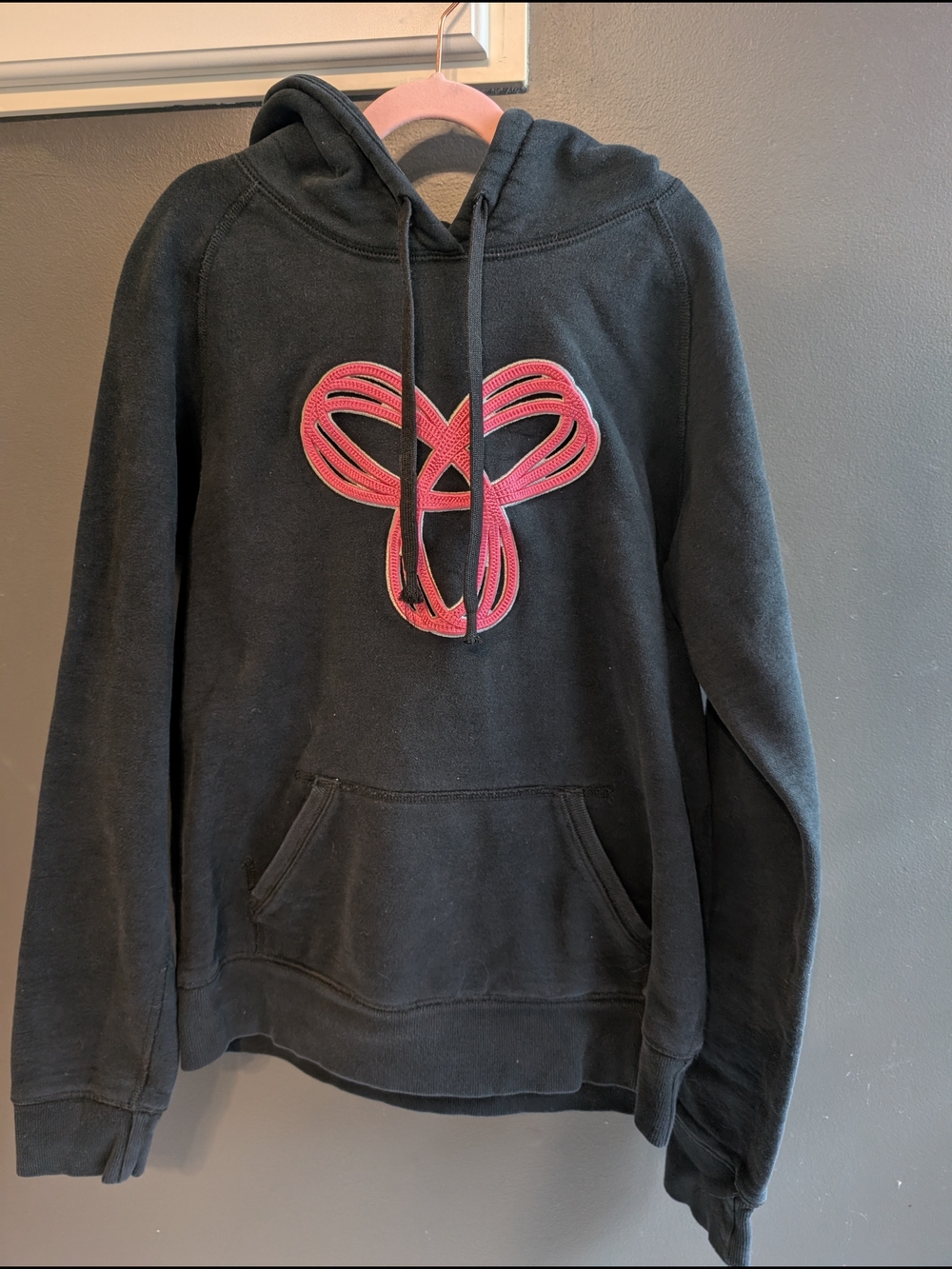 TNA Black Hoodie with Pink Logo